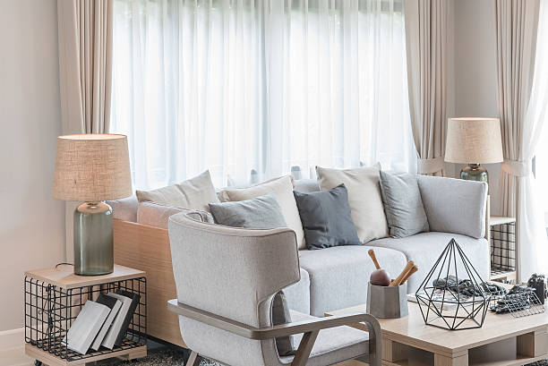 modern living room design with set of sofa and chair on carpet